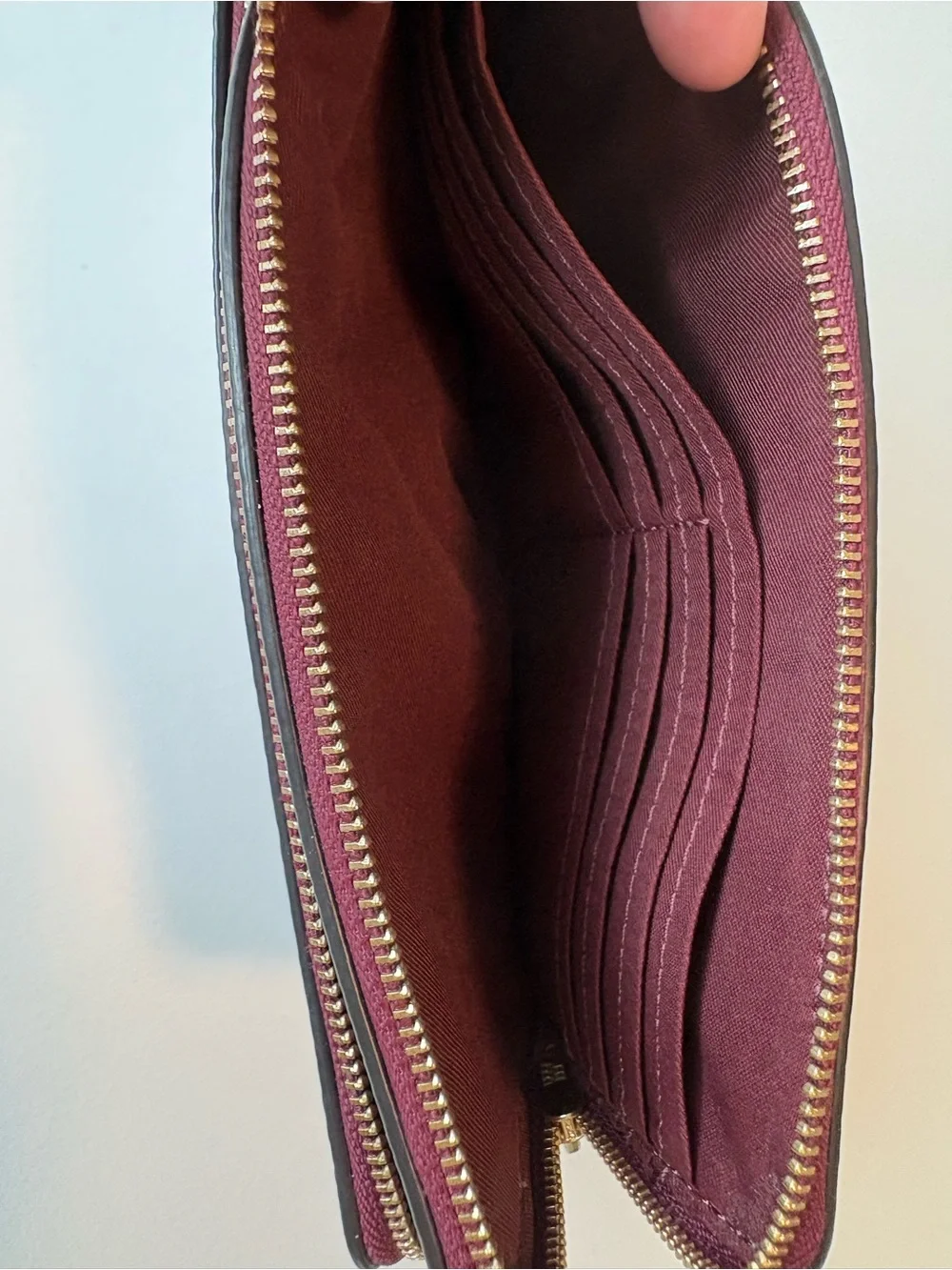 Coach corner zip